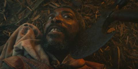Padan Fain (Johann Myers) with an axe to the neck in The Wheel of Time Season 3 Ep 7