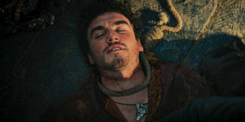 Mat Cauthon (Dónal Finn) unconscious with marks on his neck in The Wheel of Time Season 3 Ep 8