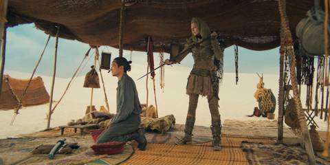 Melindhra (Synnøve Macody Lund) points her spear at Lan Mandragoran (Daniel Henney) from behind in The Wheel of Time Season 3 Ep 8