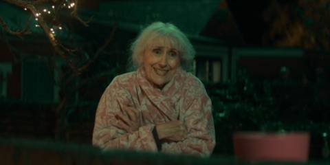 Anita Dobson as Mrs. Flood talking to an off-screen Belinda as she is taken away in Doctor Who.