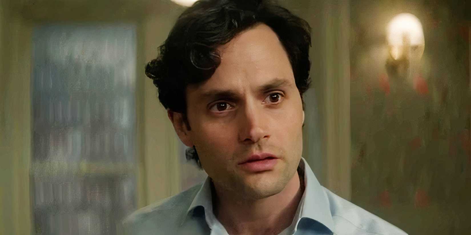 Penn Badgley looking serious as Joe Goldberg in You