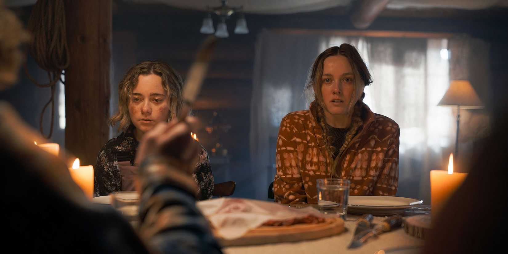 Snowboarders at the table looking terrified