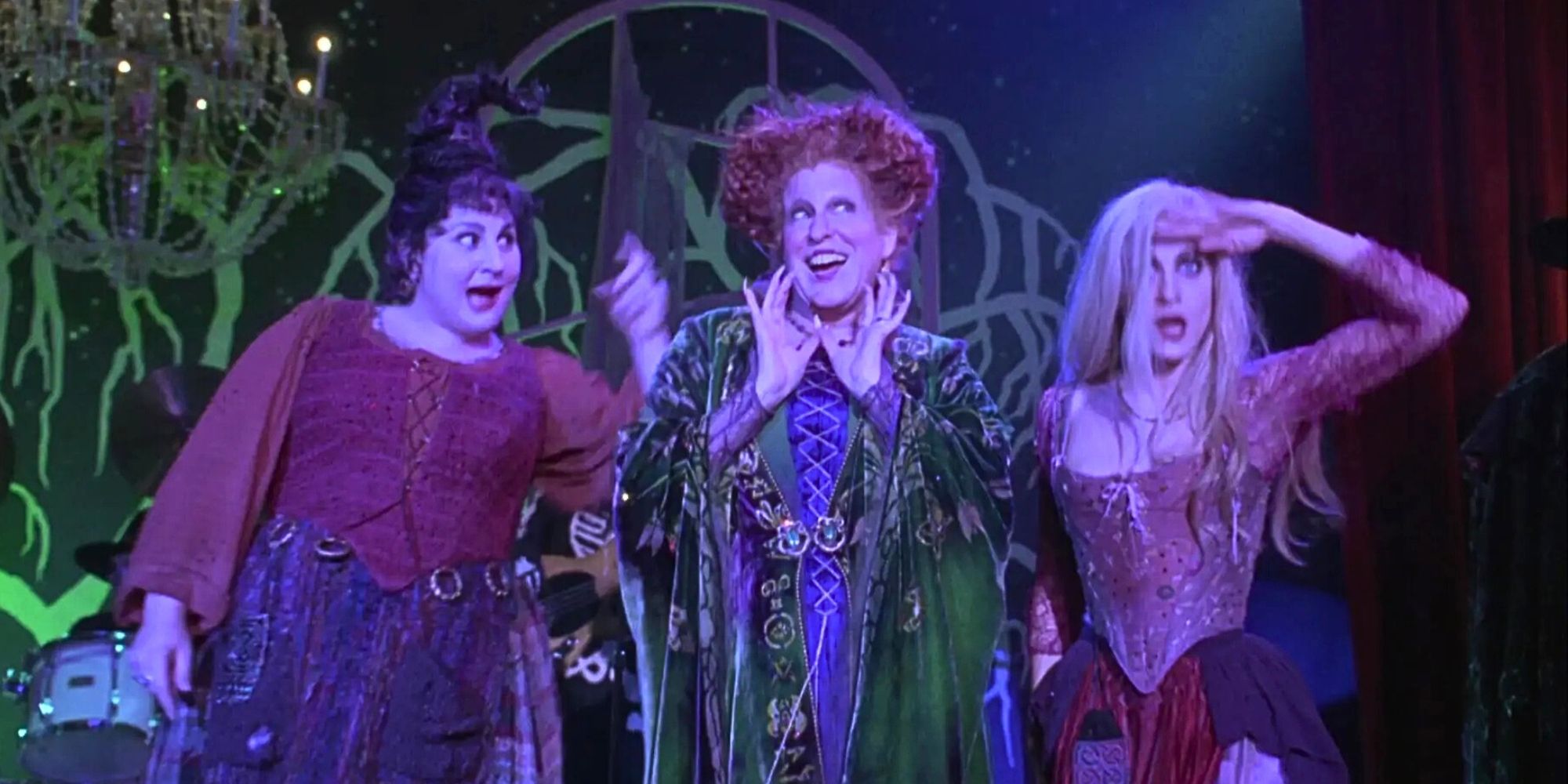 Mary, Winifred, and Sarah Sanderson performing on stage in Hocus Pocus