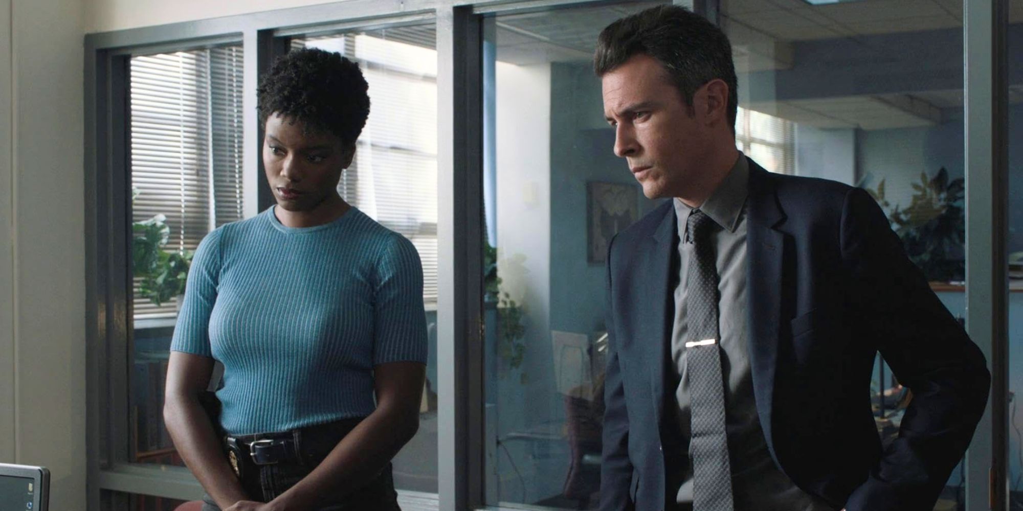 Katherine Renee Kane as Tiffany in blue shirt standing next to John Boyd as Stuart