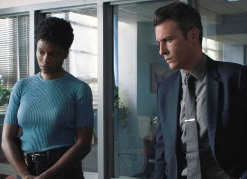 Katherine Renee Kane as Tiffany in blue shirt standing next to John Boyd as Stuart