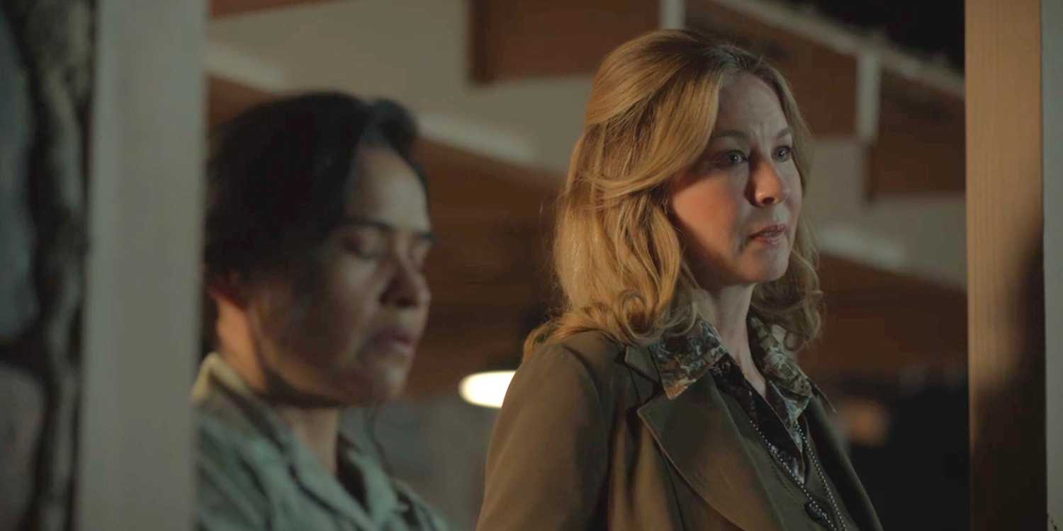 Emma Leaphorn (Deanna Allison) and Special Agent Sylvia Washington (Jenna Elfman) standing next to each other in Dark Winds season 3, episode 5