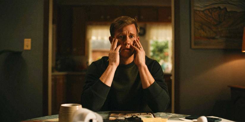 Jeff (Warren Kole) touching his face and looking shocked in Yellowjackets Season 3 Ep 10