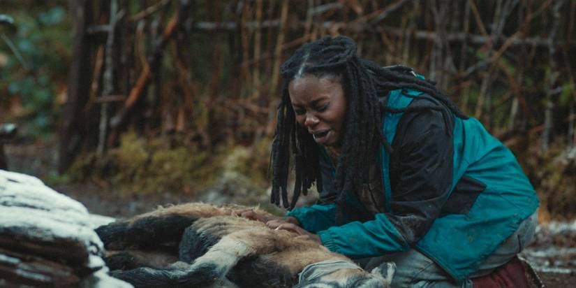 Teen Akilah (Nia Sondaya) crying over the dead animals in Yellowjackets Season 3 Ep 10