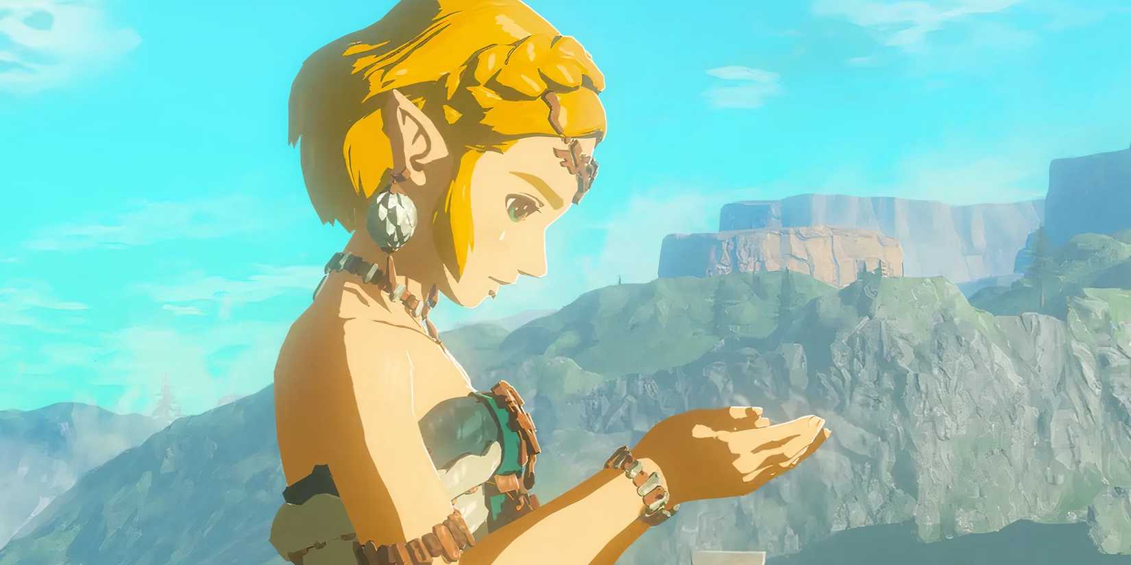Zelda cupping her hands and looking down in Tears of the Kingdom.