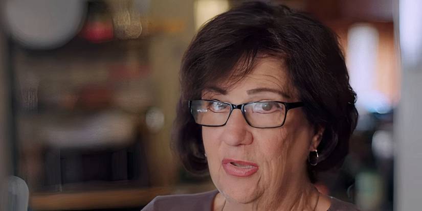 90 Day Fiance's Lucille Chillak speaking directly to camera wearing glasses