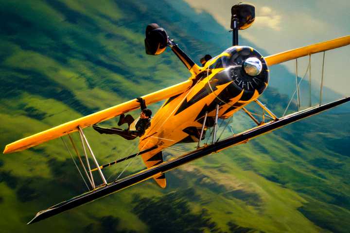 plane and Tom Cruise falling out of it in Mission: Impossible - The Final Reckoning