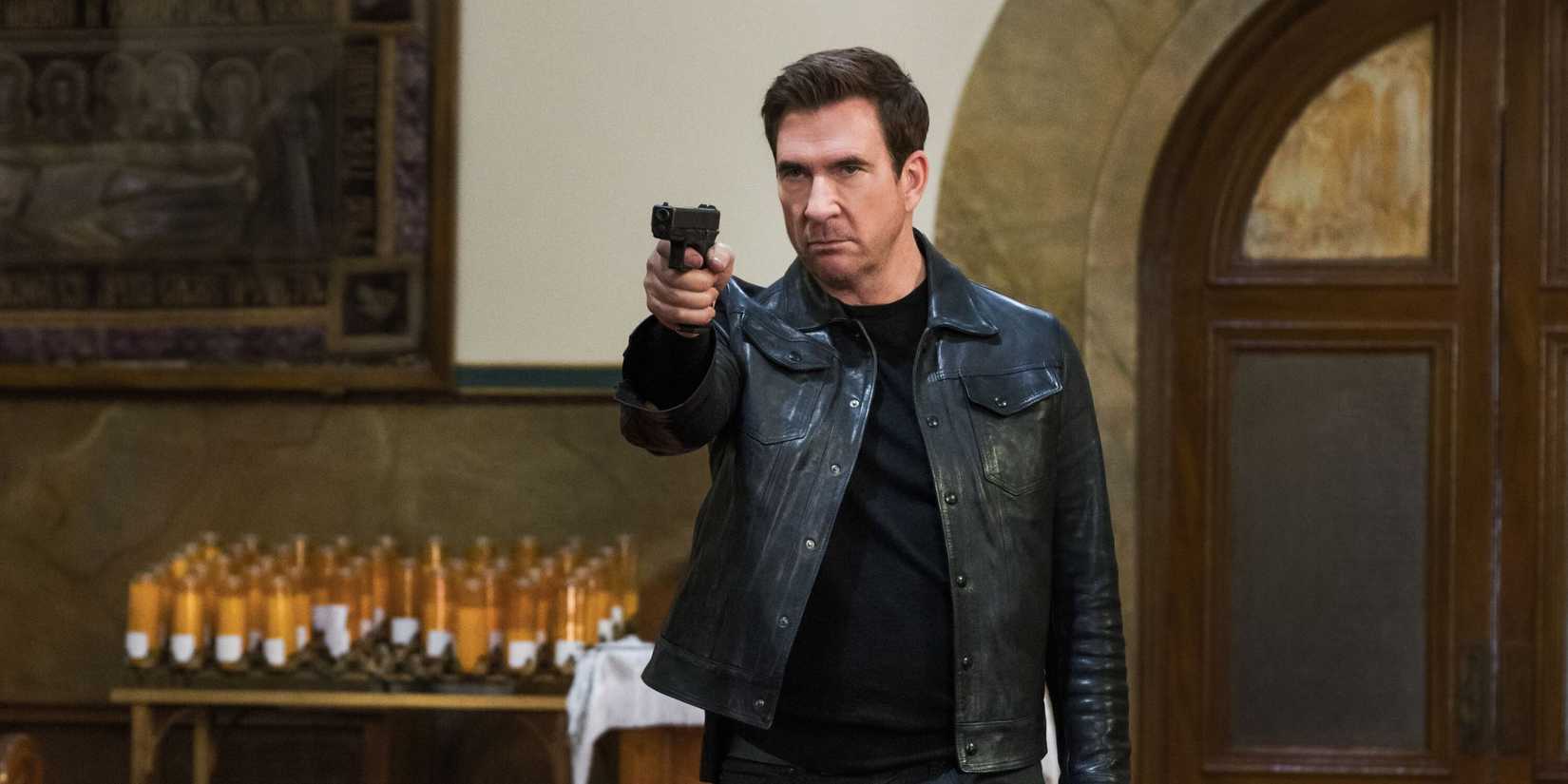 Remy holding a gun at a church in FBI: Most Wanted