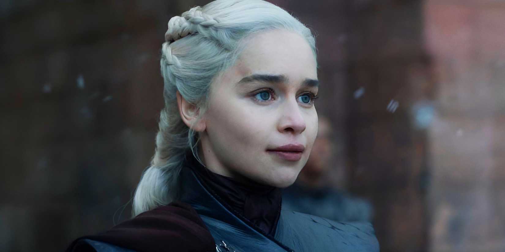 Emilia Clarke as Daenerys Targaryen with a tense smile in Game of Thrones season 8