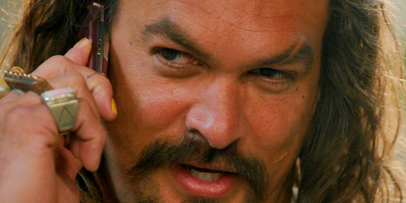 A closeup of Jason Momoa on the phone in Fast X