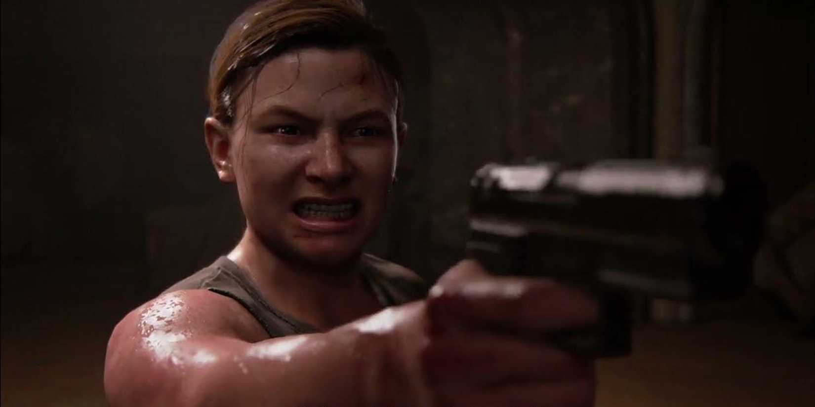 Abby holding a gun in The Last of Us Part II