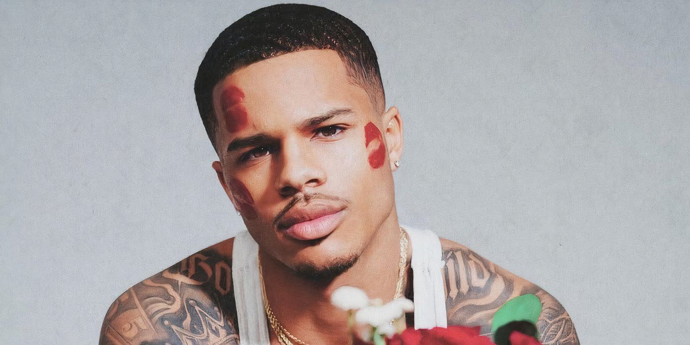 Ace Greene from Love Island USA Season 7 with kiss marks on his face.