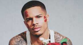 Ace Greene from Love Island USA Season 7 with kiss marks on his face.