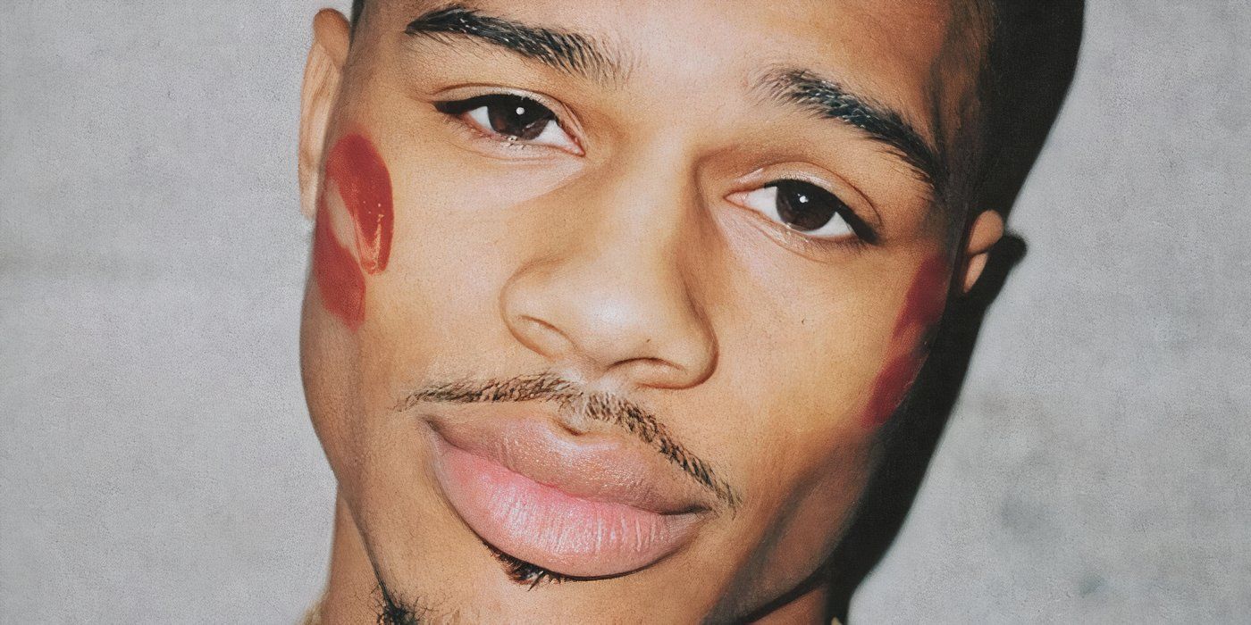 Ace Greene from Love Island USA Season 7 with kiss marks on his face.
