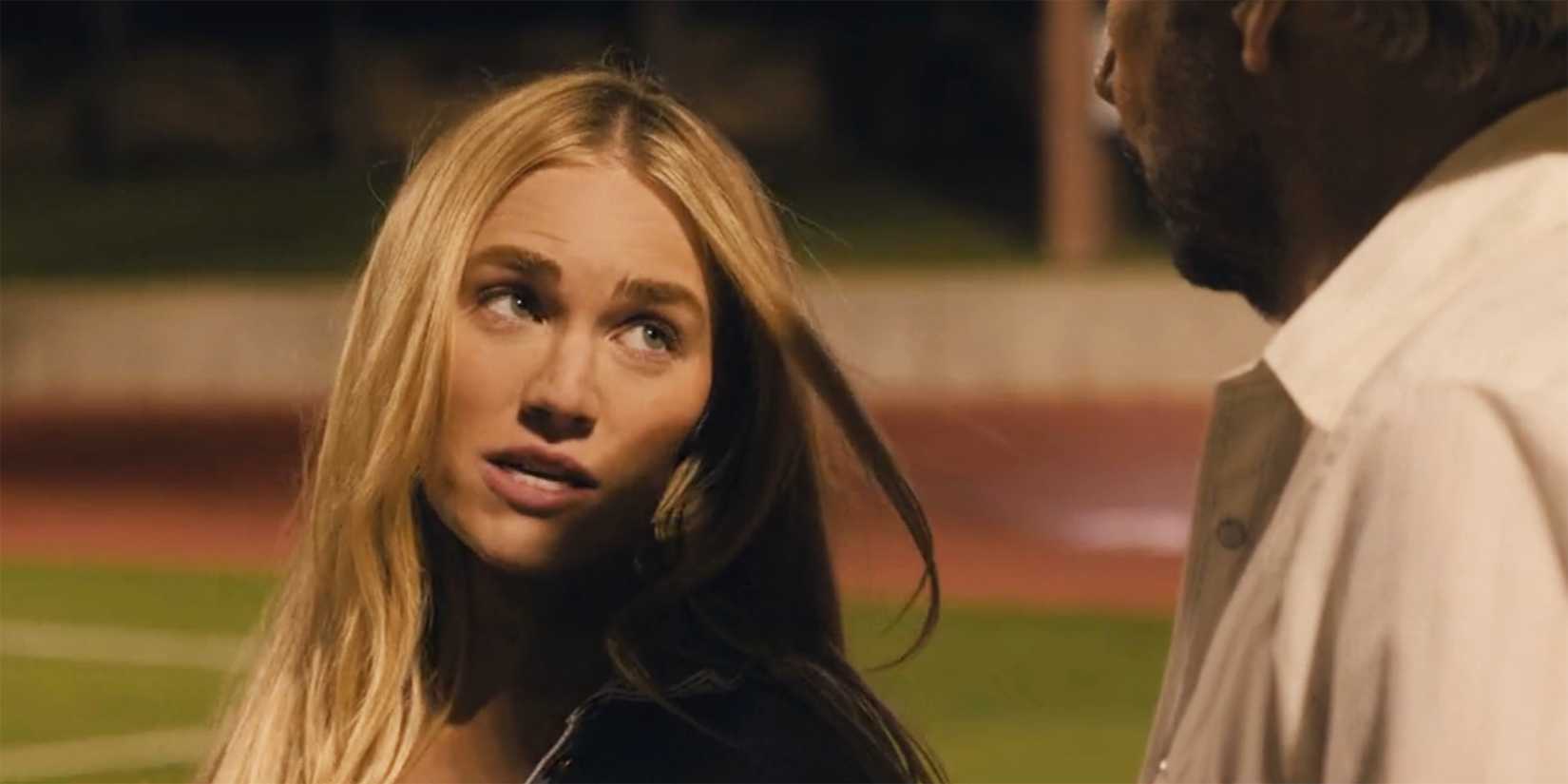 Ainsley at a football game in Landman premiere