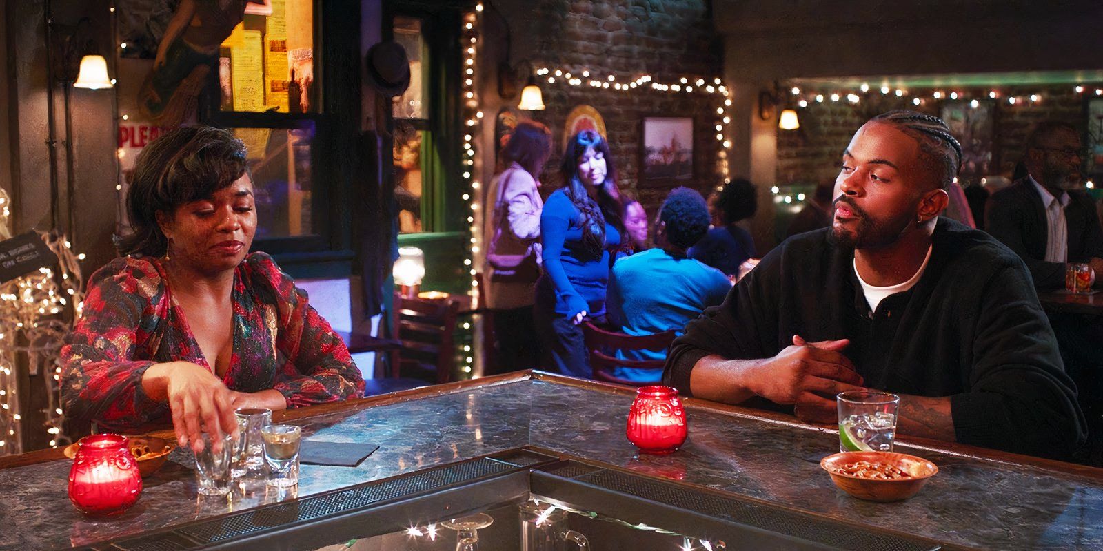Alexis Floyd as Simone Griffith and Trevor Jackson as an unnamed intern in Grey's Anatomy season 21, episode 17