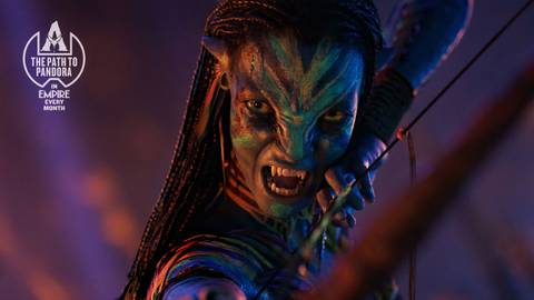 Neytiri aims her bow with her fangs bared in Avatar Fire and Ash
