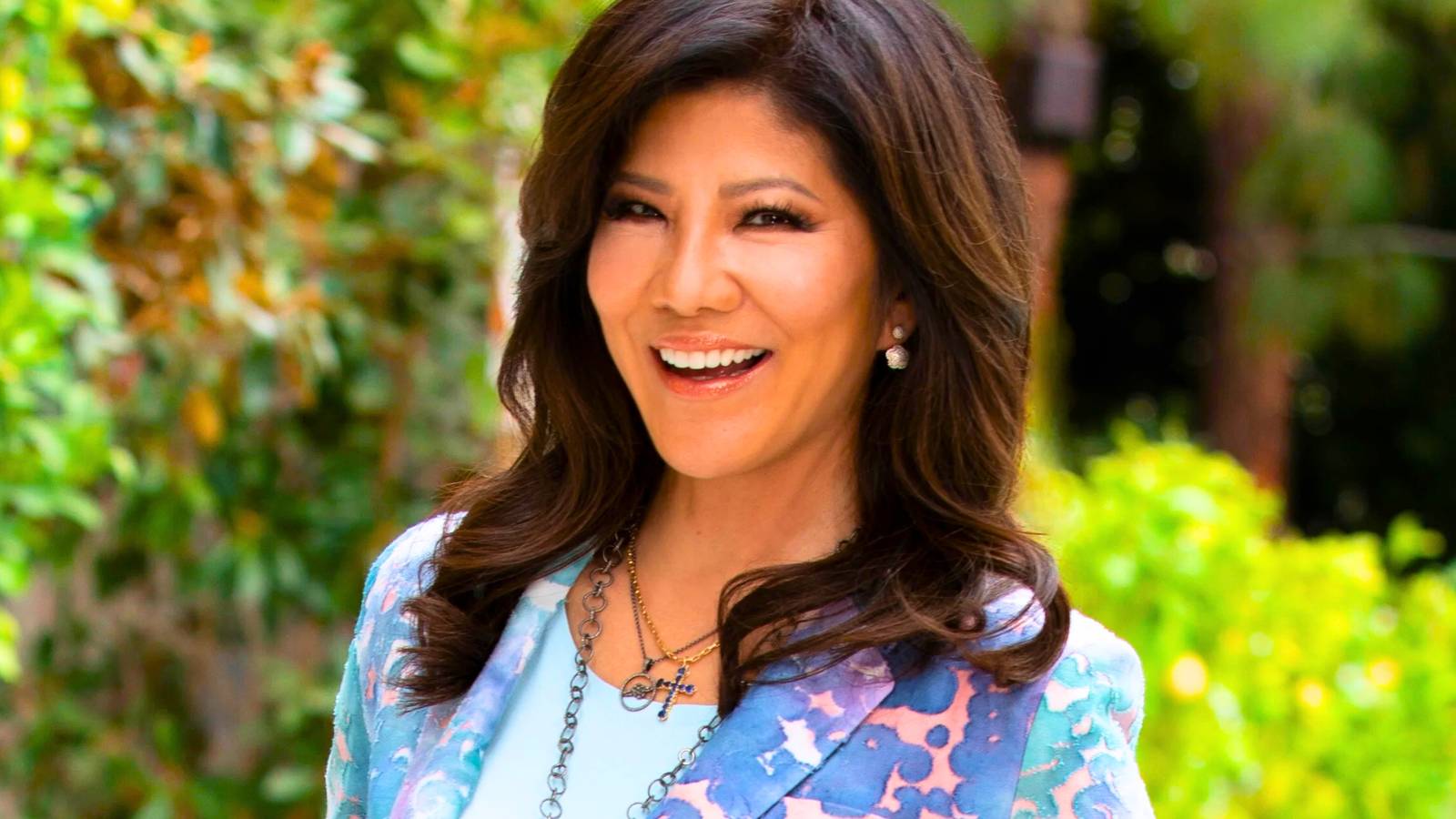 Big Brother Host Julie Chen smiling in close up image