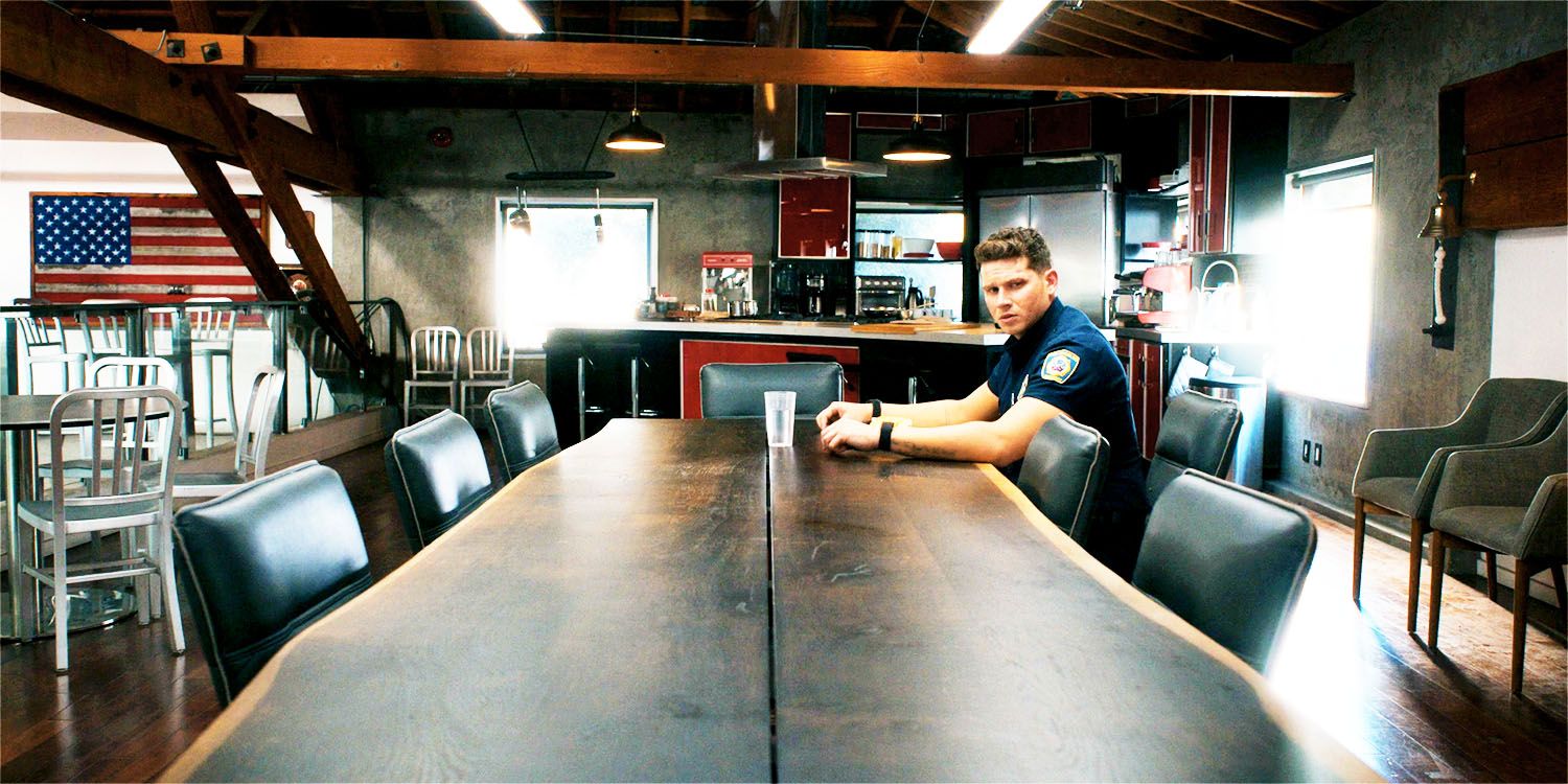 Buck in 9-1-1 season 8, episode 17, at an empty table
