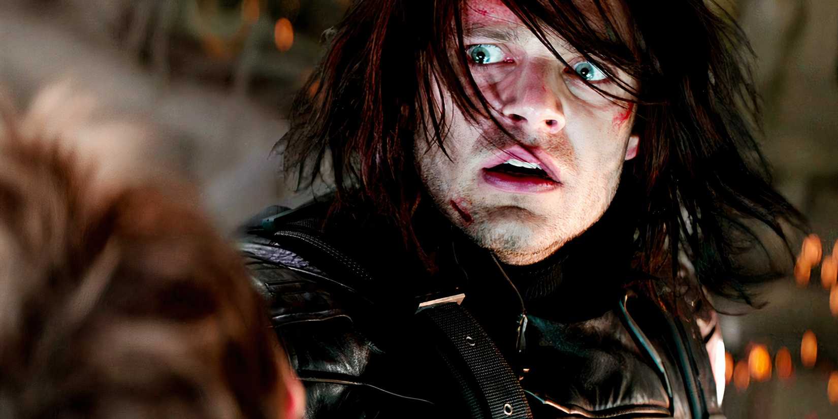 bucky barnes looks shocked and confused while hunched over steve rogers in captain america the winter soldier