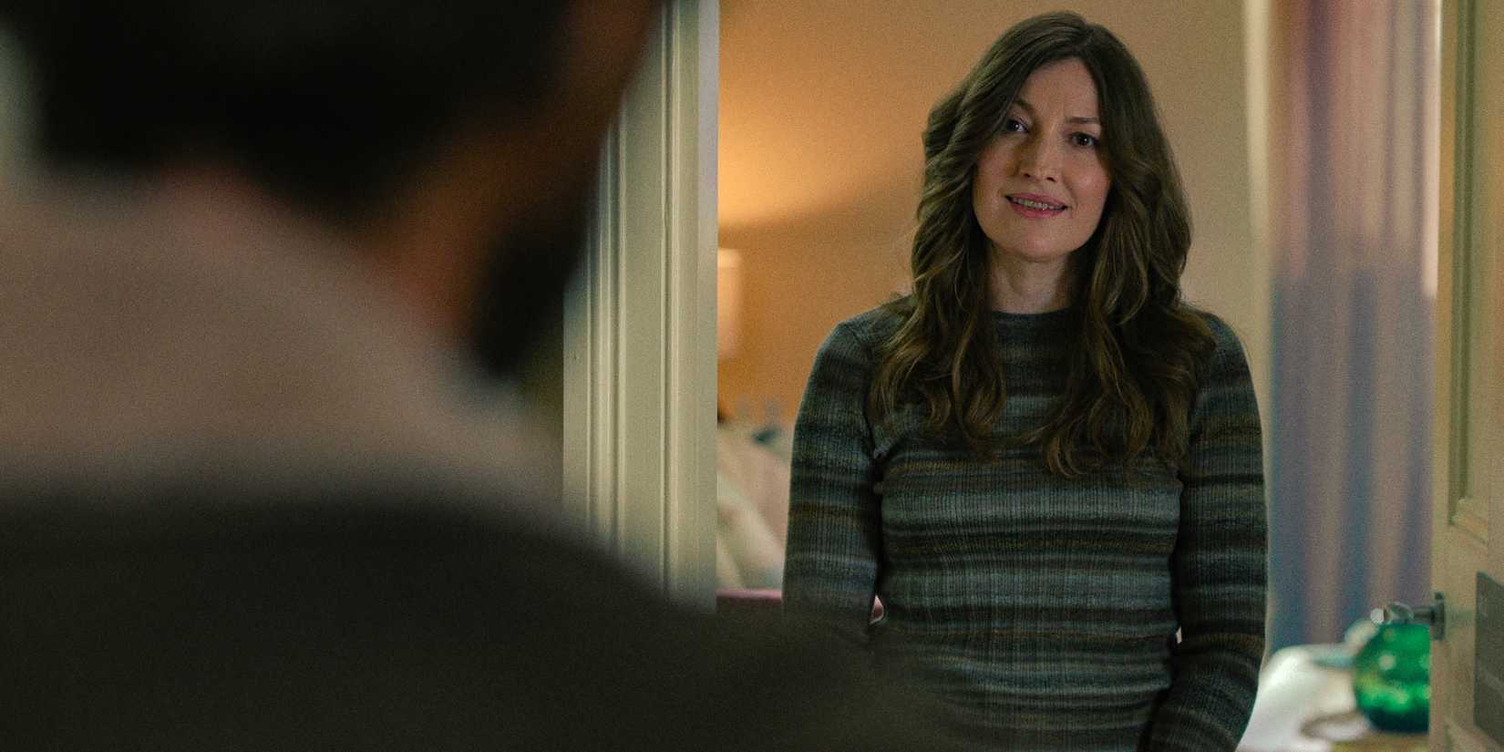 Dr. Rachel Irving (Kelly Macdonald) with a slight smile in Dept. Q Season 1