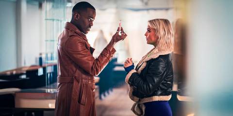 Ncuti Gatwa handing Millie Gibson a vial as the Doctor & Ruby Sunday in Doctor Who