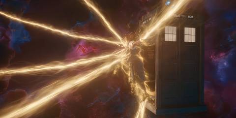 The Fifteenth Doctor in the middle of his regeneration leaning out of the TARDIS in Doctor Who