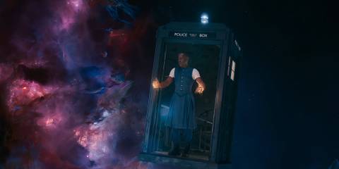 The Fifteenth Doctor starting to regenerate while standing in the doorway of the TARDIS in Doctor Who
