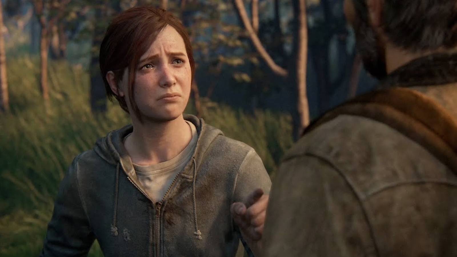 Ellie looking heartbroken in The Last of Us Part II