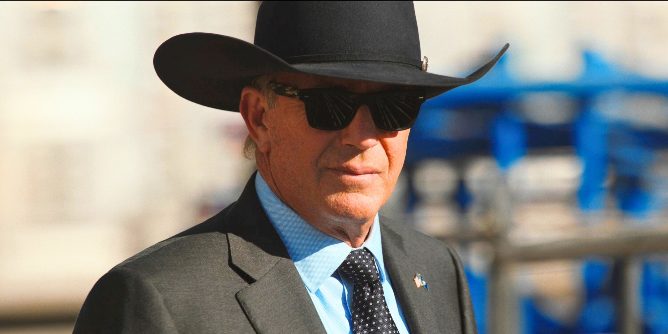 The West's Kevin Costner wears a black cowboy hat