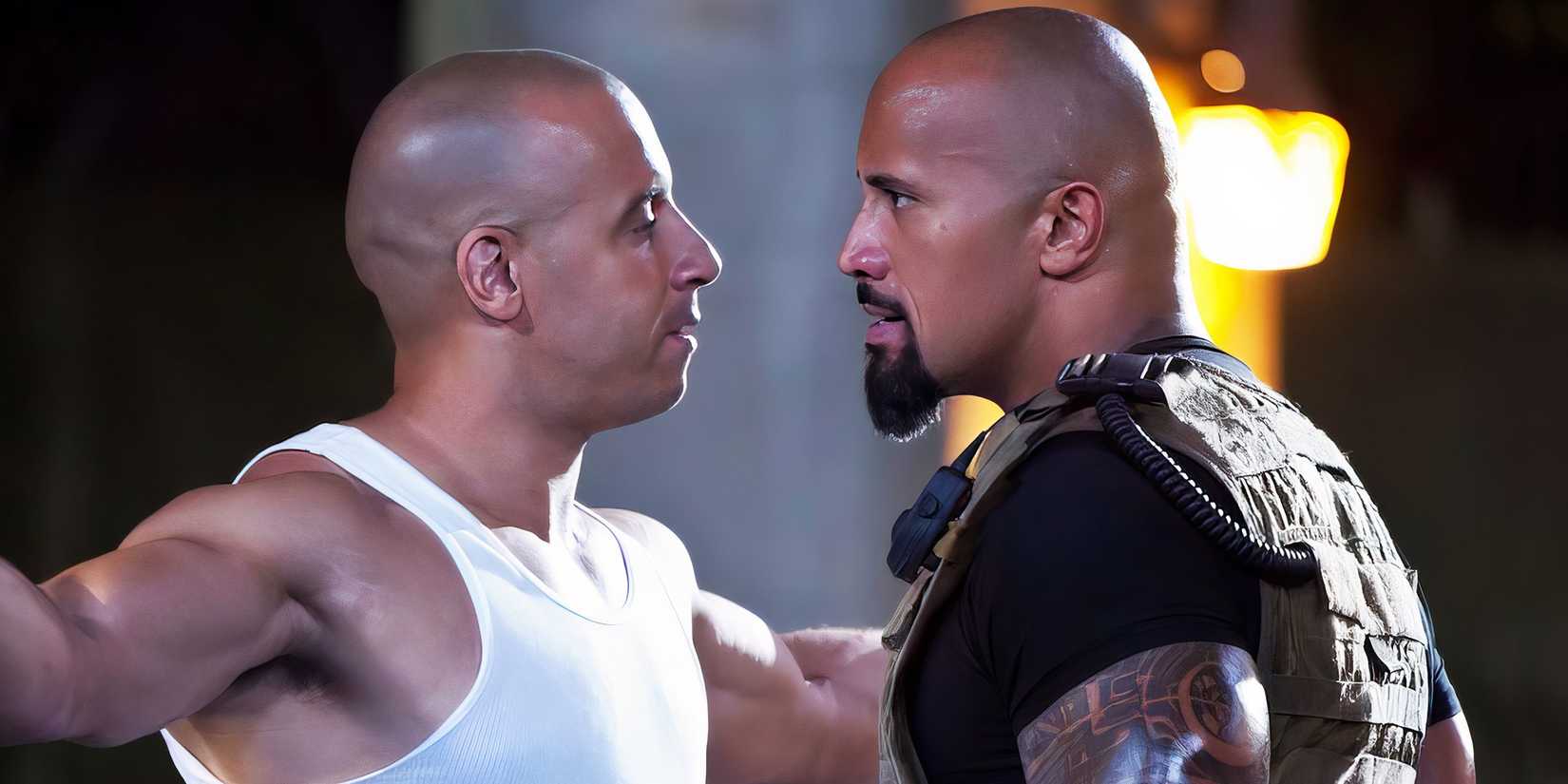 Лук Хобс (Двейн Джонсон) и Дом (Вин Дизель) смотрят друг на друга в фильме "Fast Five".