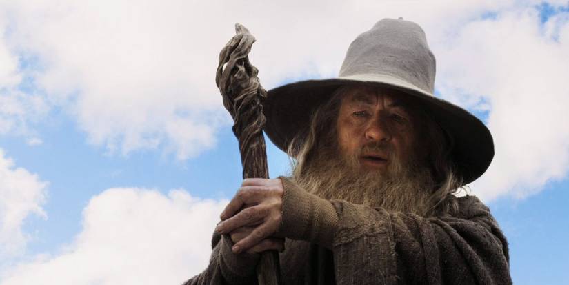 Gandalf holding his staff in The Lord of the Rings.