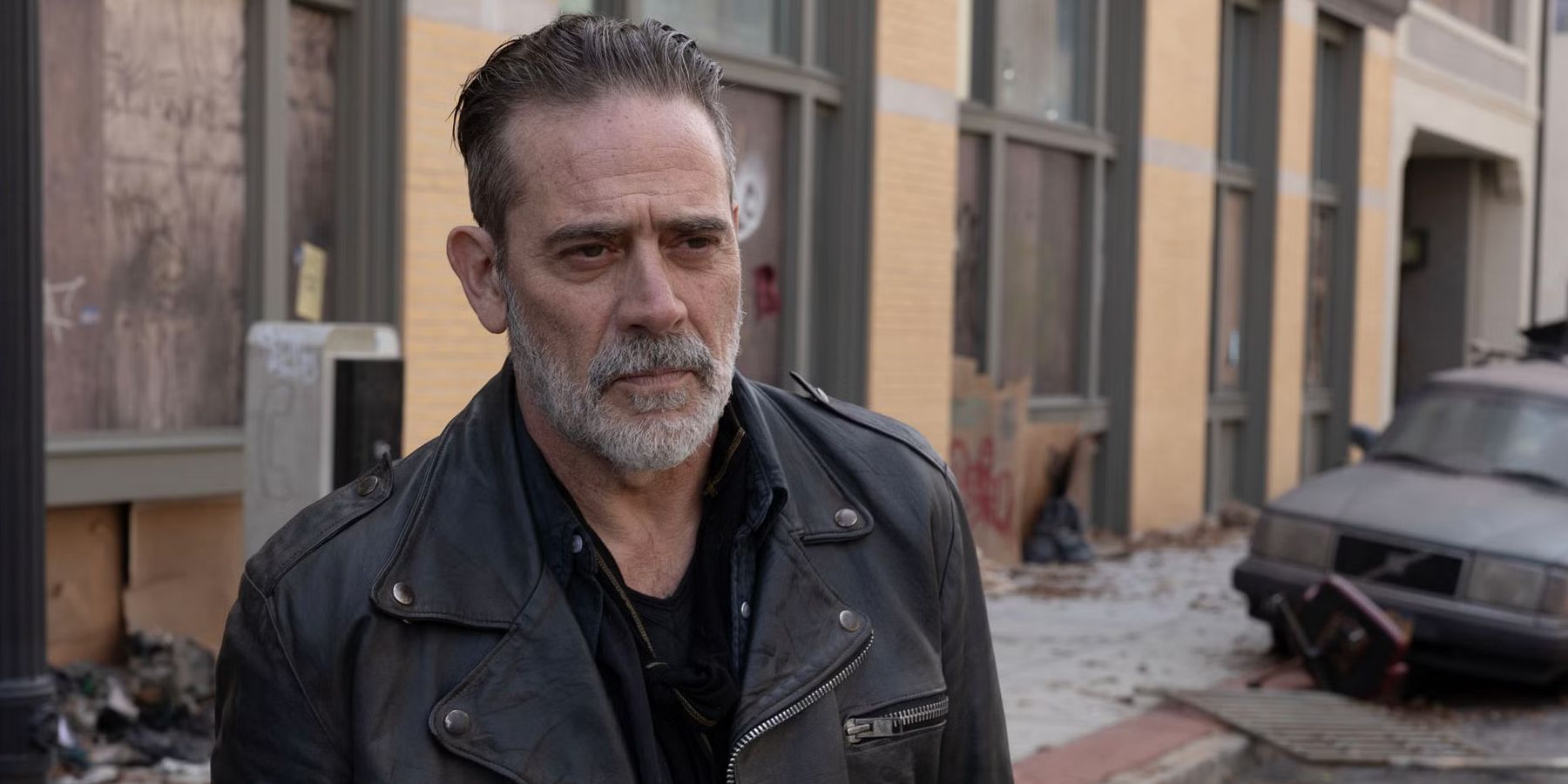 Jeffrey Dean Morgan as Negan looking mildly annoyed in The Walking Dead: Dead City season 2