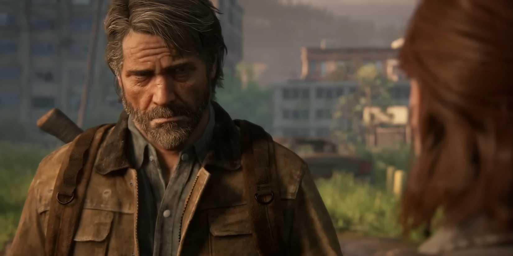 Joel looking up at Ellie in The Last of Us Part II