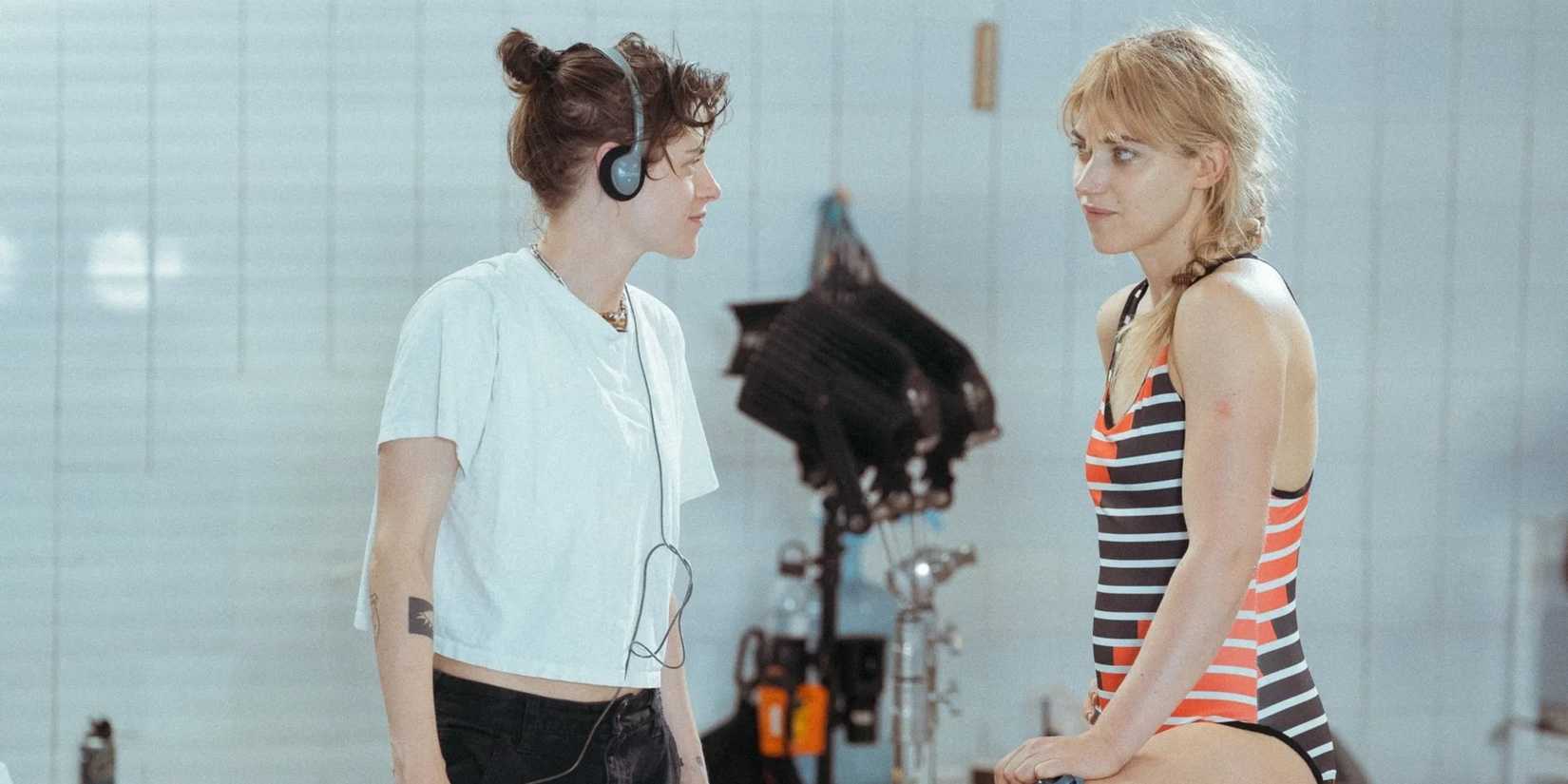 Kristen Stewart talks to Imogene Poots on the set of The Chronology of Water