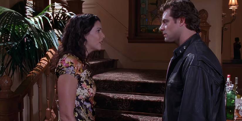 Lorelai and Christopher fighting by the stairwell in Gilmore Girls season 3 Haunted Leg episode