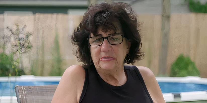 90 Day Fiance's Lucille Chillak sitting outdoors