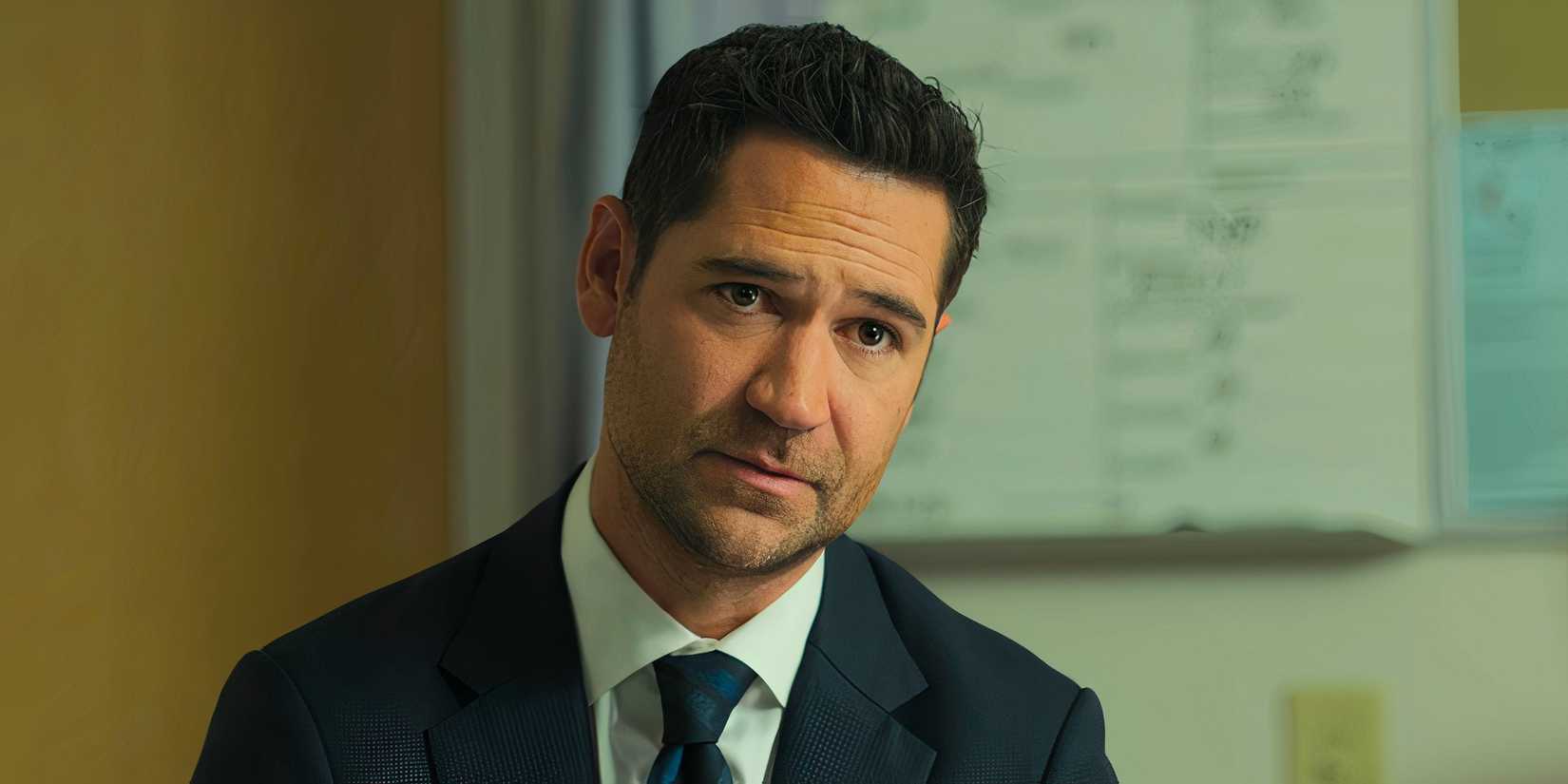 Mickey looking serious with his head tilted to the side in The Lincoln Lawyer season 3 episode 10