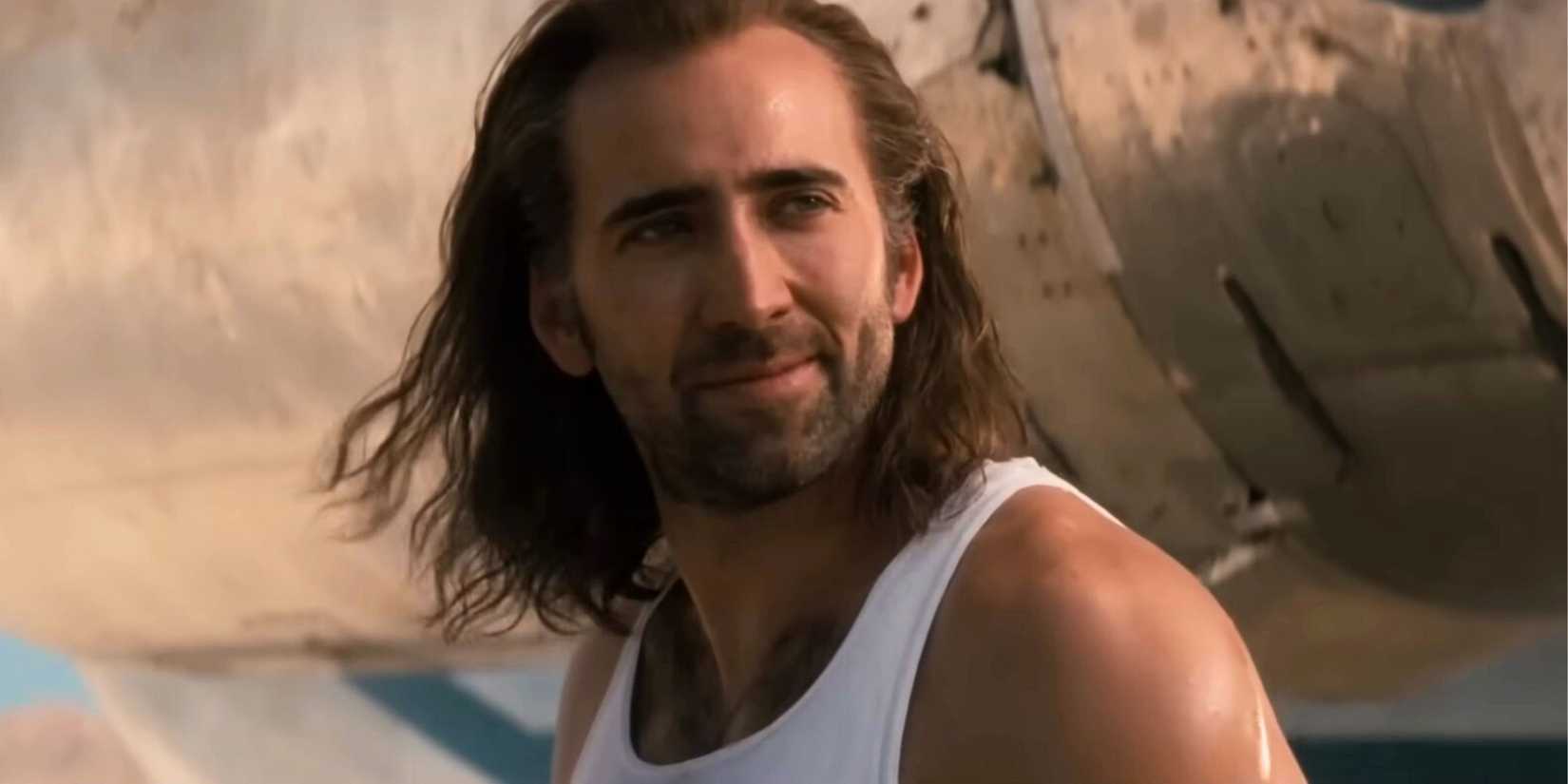 Nicolas Cage as Cameron Poe by an airplane in Con Air