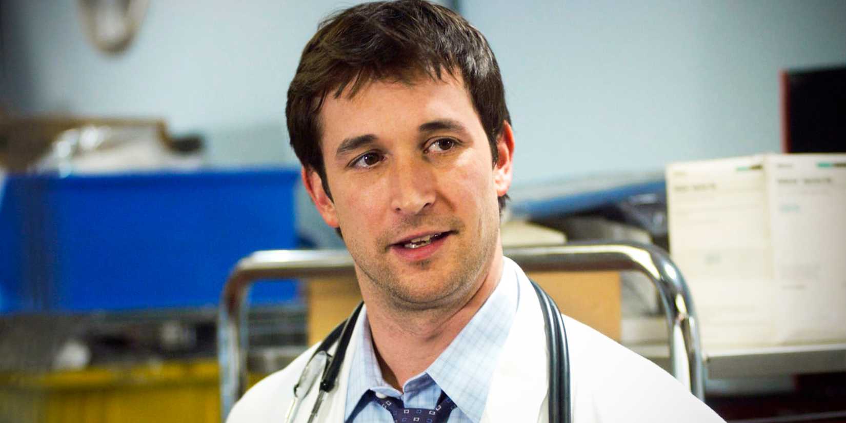 Noah Wyle smiling as John Carter in  ER