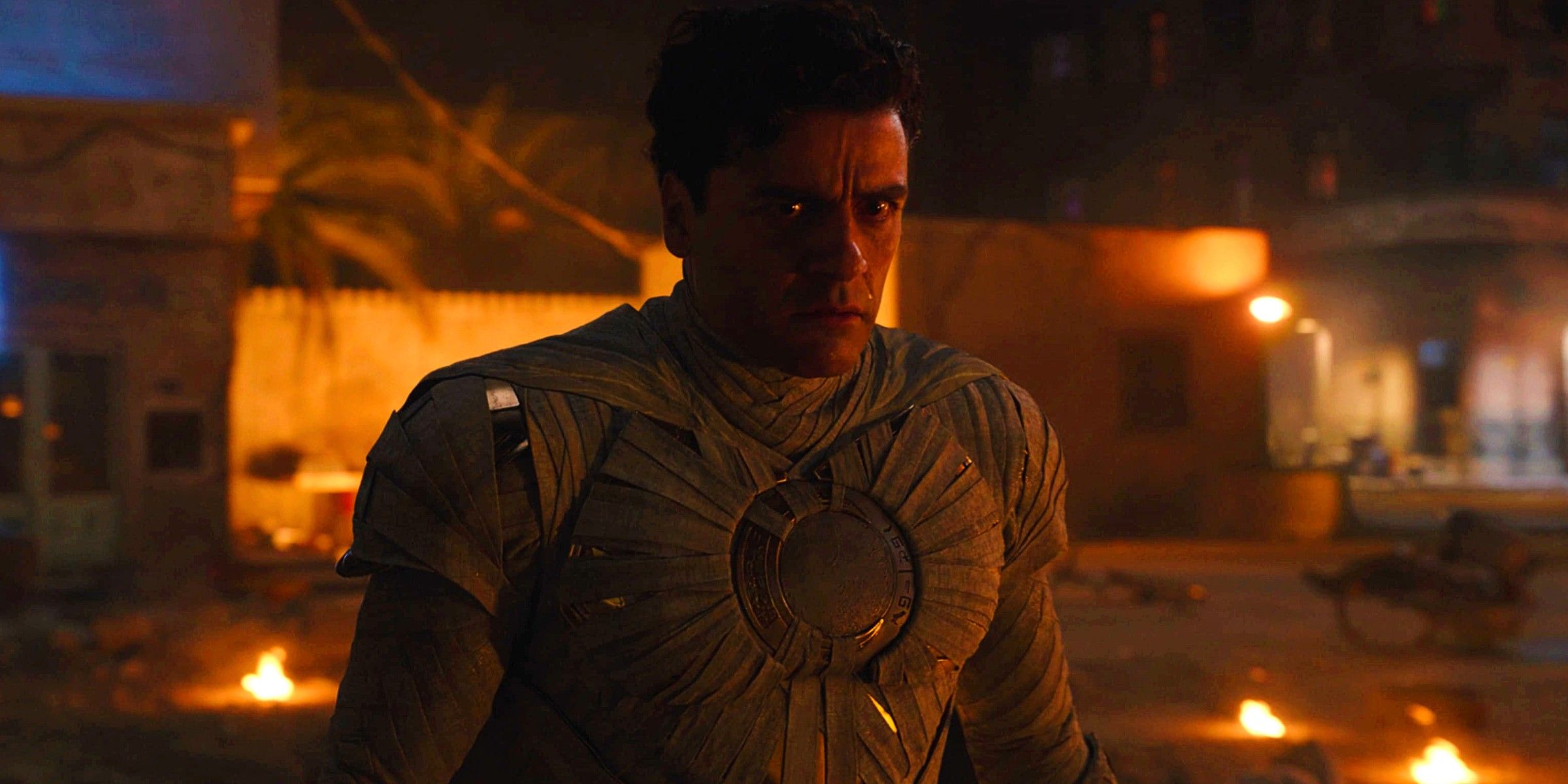 Oscar Isaac As Marc Spector In Moon Knight Suit Amid Destroyed Streed In Moon Knight Episode 6