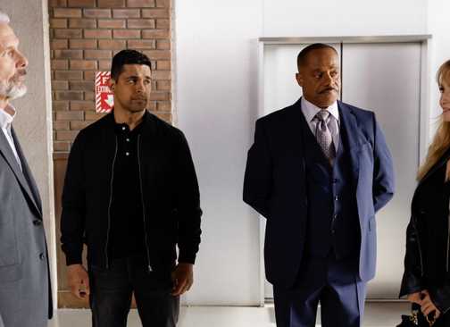 Parker, Torres, and Vance look unimpressed with a smiling Carla Marino in NCIS Season 22 Episode 20