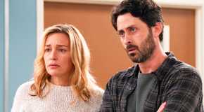 Piper Perabo and Andy Bean with nervous expressions in Grey's Anatomy season 21 episode 16