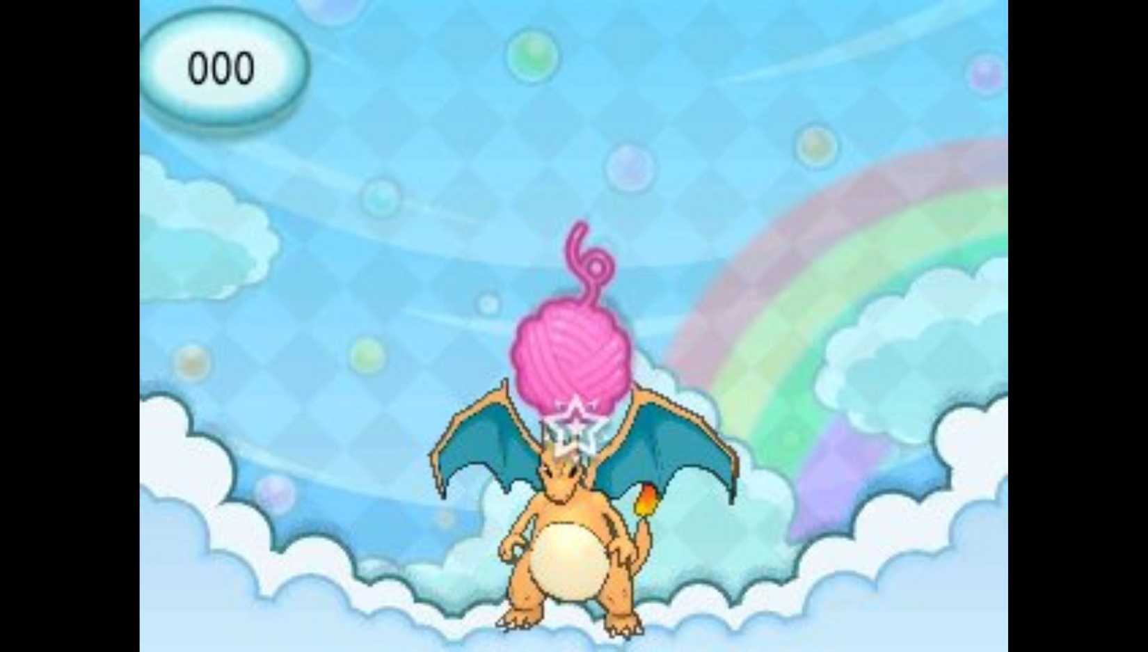 Pokemon Amie mini game from X and Y featuring Charizard with a ball of yarn
