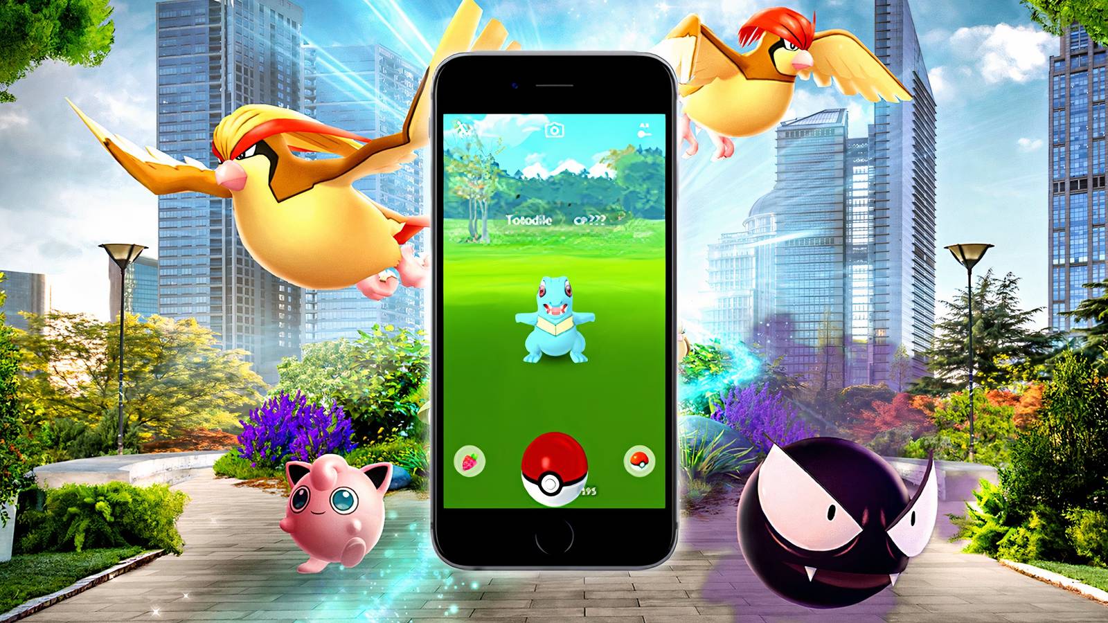 Pokemon go on a phone capturing totodile with other pokemon coming out of the center in a photo of a real wold park