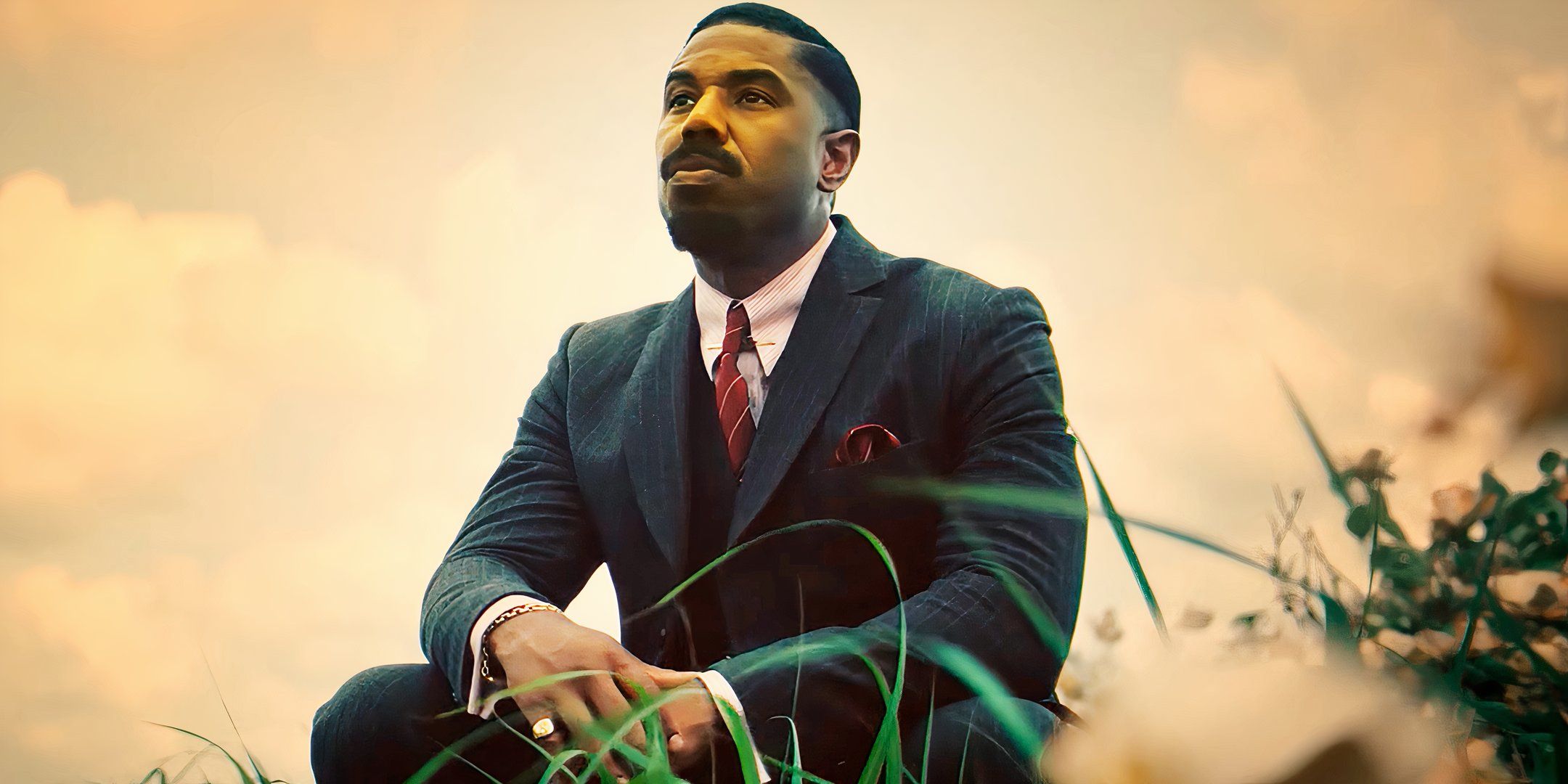 Michael B. Jordan is looking at the horizon in Sinners